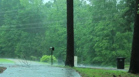 Rain falling in neighborhood Stock Footage 10865651