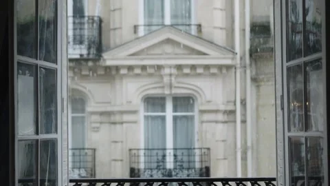 Rain falling outside apartment window in paris Stock Footage 309298777