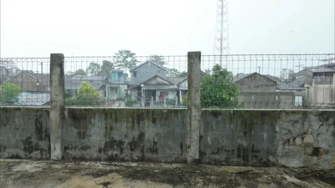 Rain falling over a dense residential neighborhood Video stock 346631794