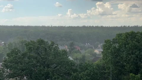Rain Falling Over Green Forest and Village Houses Stock-Footage 335461678