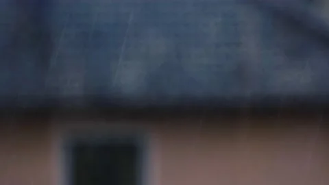 Rain falling over the house rooftops Video stock 139800466