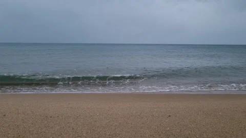 Rain Falling Over Sea and Sand, Moody Coastal Atmosphere Stock Footage 318740861