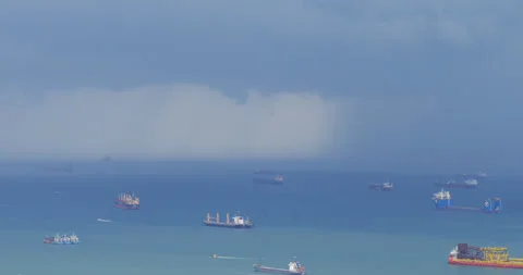 Rain falling over the Singapore Strait Stock Footage 306574225