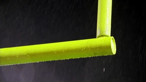 Rain falling over the yellow goalpost at night Stock Footage 113276153