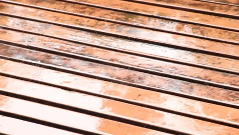 Rain falling on Planks Stock Footage 8629413