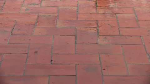 Rain falling on the red tiles of a terrace Stock Footage 161955261