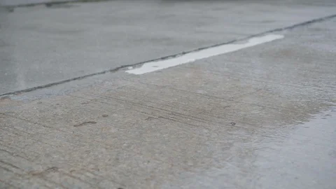 Rain falling on the road. Stock-Footage 92460804