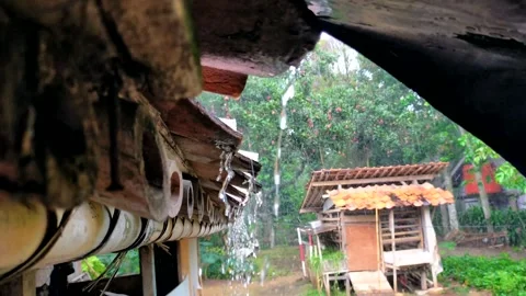 Rain falling from the roof of the house Stock Footage 285196665