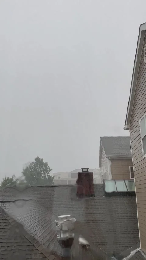 Rain Falling on Rooftop Stock Footage 312278978