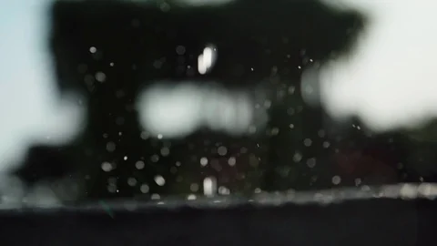 Rain falling in slow motion Stock Footage 128091153