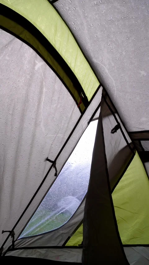 Rain Falling on a Tent - Inside View of Camping Shelter During Rainstorm Stock Footage 283917483
