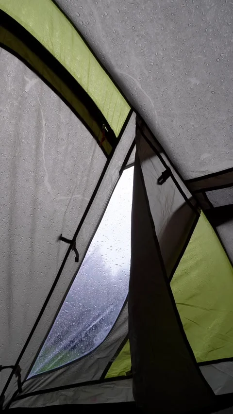 Rain Falling on a Tent - Inside View of Camping Shelter During Rainstorm Stock Footage 283917614