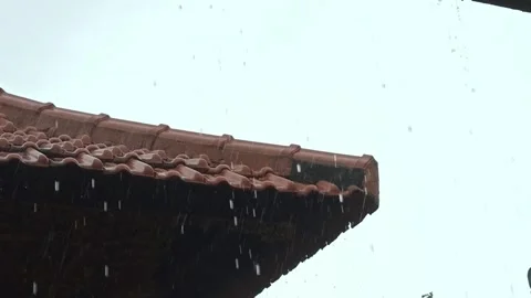 Rain Falling on a Tiled Roof Stock Footage 302772905