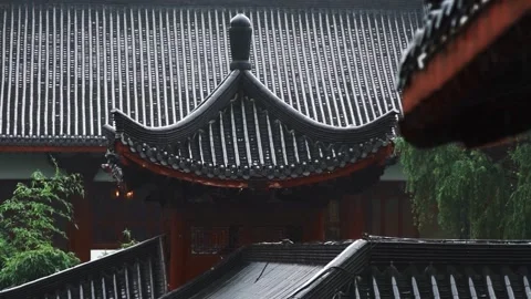 Rain Falling on Traditional Chinese Temple Roofs in a Misty Jiangnan Water Town Stock Footage 342018550