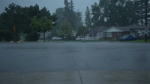 Rain falling as traffic passes. Stock Footage 157947760