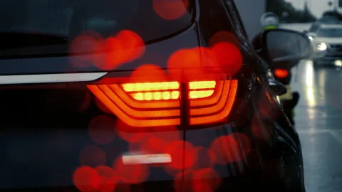 Rain falling while a car is stuck in traffic. Stock Footage 232125201