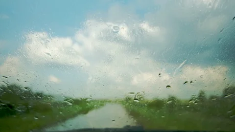 Rain falling on the window of the car Stock Footage 111057406