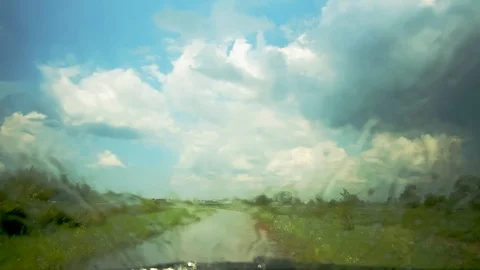 Rain falling on the window of the car Stock Footage 111057531