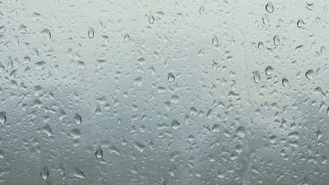 Rain falling on window Stock Footage 80750263