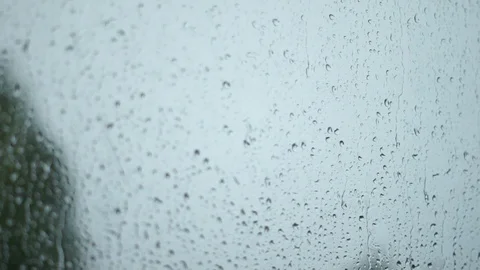 Rain Falling on Window Stock Footage 100205225