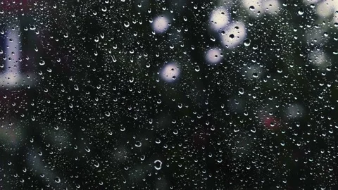 Rain falling on the window surface Stock Footage 136193729