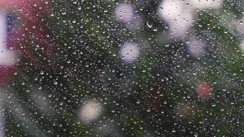 Rain falling on the window surface Stock Footage 136196019