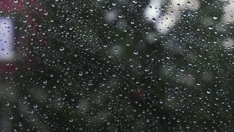 Rain falling on the window surface Stock Footage 136196098
