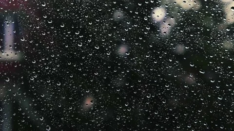 Rain falling on the window surface Stock Footage 136198834