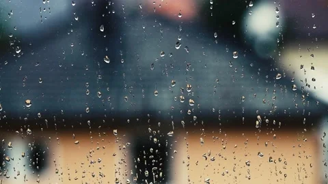 Rain falling on the window surface Stock Footage 136774160