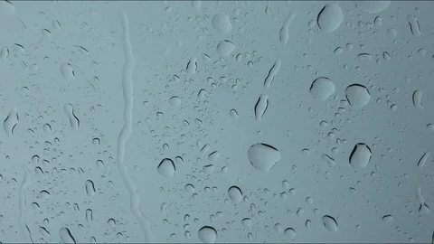 Rain falling on a windowpane Stock Footage 103492498