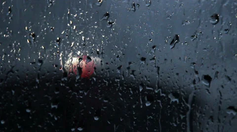 Rain falling on a windows pane Stock-Footage 37733747
