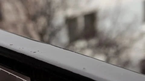 Rain falls on metalic balustrade Video stock 23724826