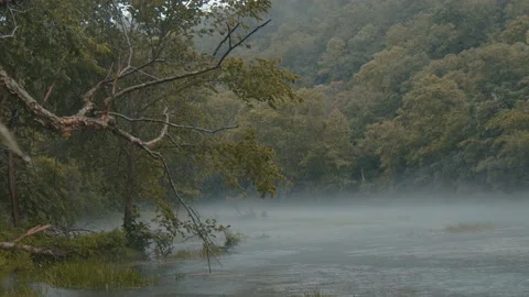 Rain Falls on a Misty Lake Vídeos de archivo 138715575