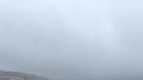 Rain falls over Spain's San Sebastián as cloudy weather blankets Basque Country, Vídeos de archivo 340550284