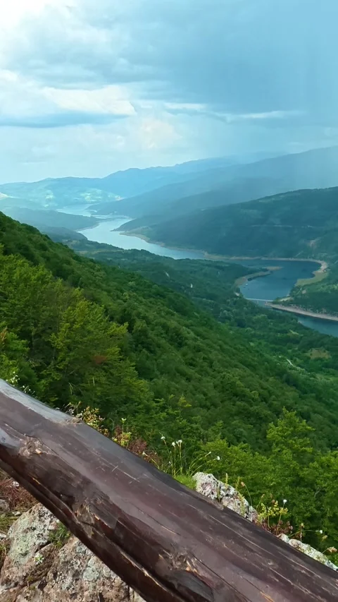 Rain falls softly over a rugged mountain vista. Kozji Kamen viewpoint, Vertical 스톡 동영상 341882182