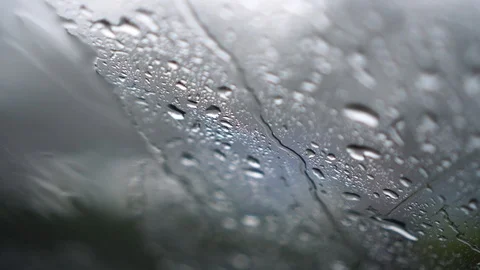 Rain falls on the windshield : 4k Stock Footage 96104367