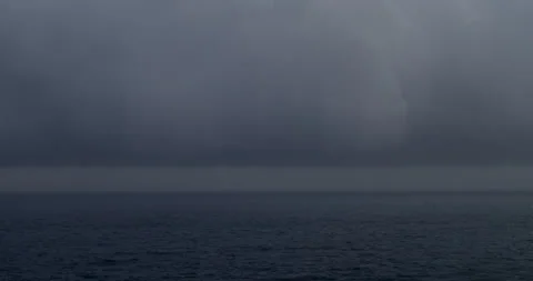 Rain far away on sea Stock Footage 160838954