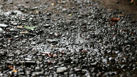 The rain fell hitting pebbles and small rocks so it was very beautiful Stock Footage 155809051