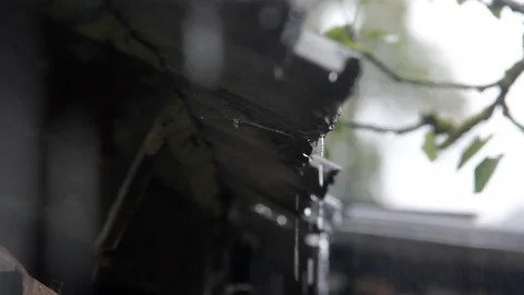 Rain Flows Down From a Roof. Видео 94778105