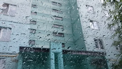 Rain flows down the windshield Stock Footage 113565805
