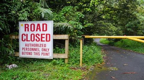 Rain forest road closed authorized personnel Stock Footage 23623391