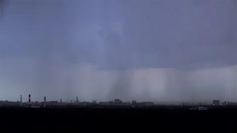 Rain front with lightning flashes over the city skyline. Stock Footage 251789334