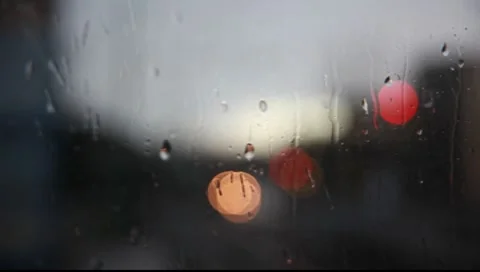 Rain on an glas with reflections Stock Footage 7908030