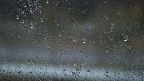 Rain on Glass: Blurry Background Stock Footage 295043656