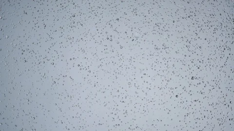 Rain on a glass window closeup macro Stock Footage 86692591