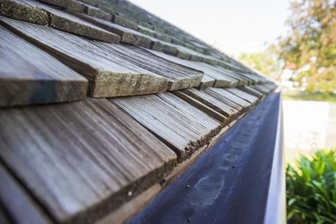Rain gutter system for lined roofs. Fotos de archivo
