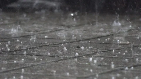 Rain with hail on the street Stock Footage