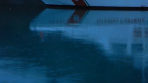 Rain in the harbor at nightfall 4921 Stock Footage 108944960