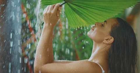 Rain is her therapy, foliage is her shelter Stock Footage 122024668