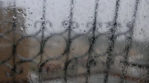 Rain Hits The Glass, The Defocused Window Grilles In The Background Stock Footage 88967437